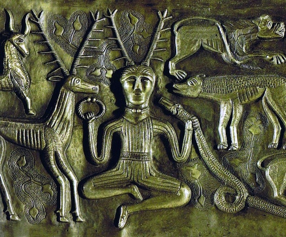 horned god seated, animals approach on both sides. Jungian therapy